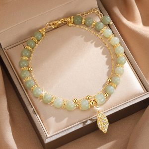 Elegant Green Beaded Bracelet with Golden Leaf Charm